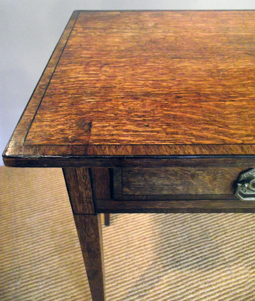 Georgian oak two drawer side table