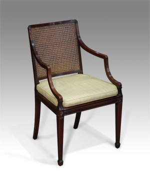 Antique caned arm chair