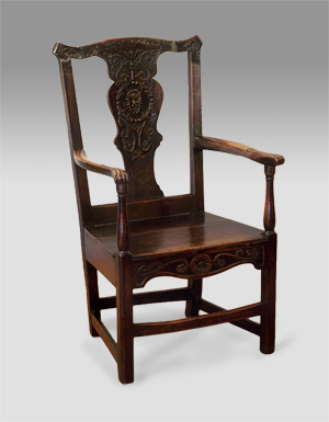 Antique carved ash arm chair