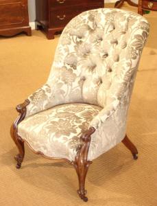 Antique rosewood button back armchair