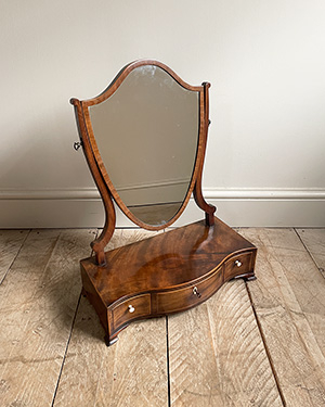 Antique toilet mirror