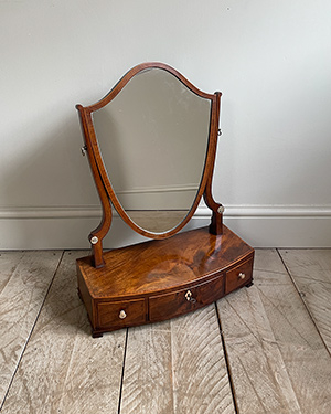 Antique toilet mirror