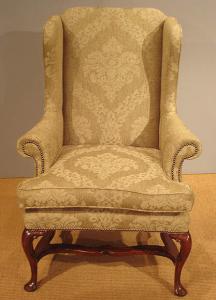 Antique upholstered armchair