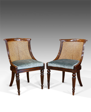 Near pair of Regency caned chairs